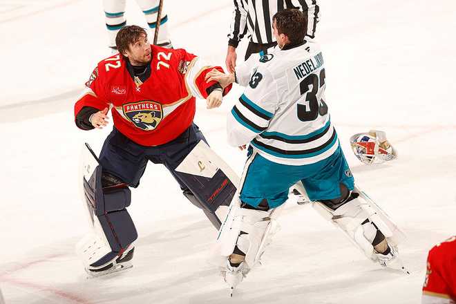 SUNRISE, FLORIDA - JANUARY 19: Goaltender Sergei Bobrovsky #72 of the Florida Panthers fights with Goaltender Alex Nedeljkovic #33 of the San Jose Sharks at the Amerant Bank Arena on January 19, 2026 in Sunrise, Florida. (Photo by Eliot J. Schechter/NHLI via Getty Images)