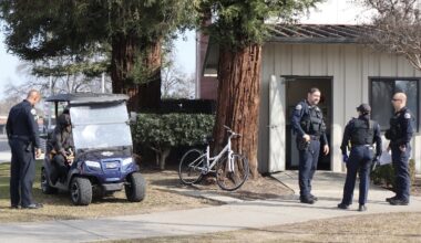 Officers Gilbert Ovalle and Alexandra Medina stand to the right at the SCCCD Police Department building on Weldon Ave. on Jan 28.