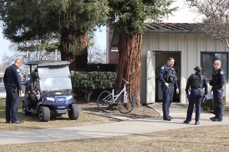 Officers Gilbert Ovalle and Alexandra Medina stand to the right at the SCCCD Police Department building on Weldon Ave. on Jan 28.