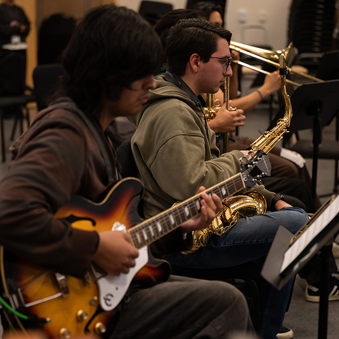 guitar player practicing with Renegade Jazz combo