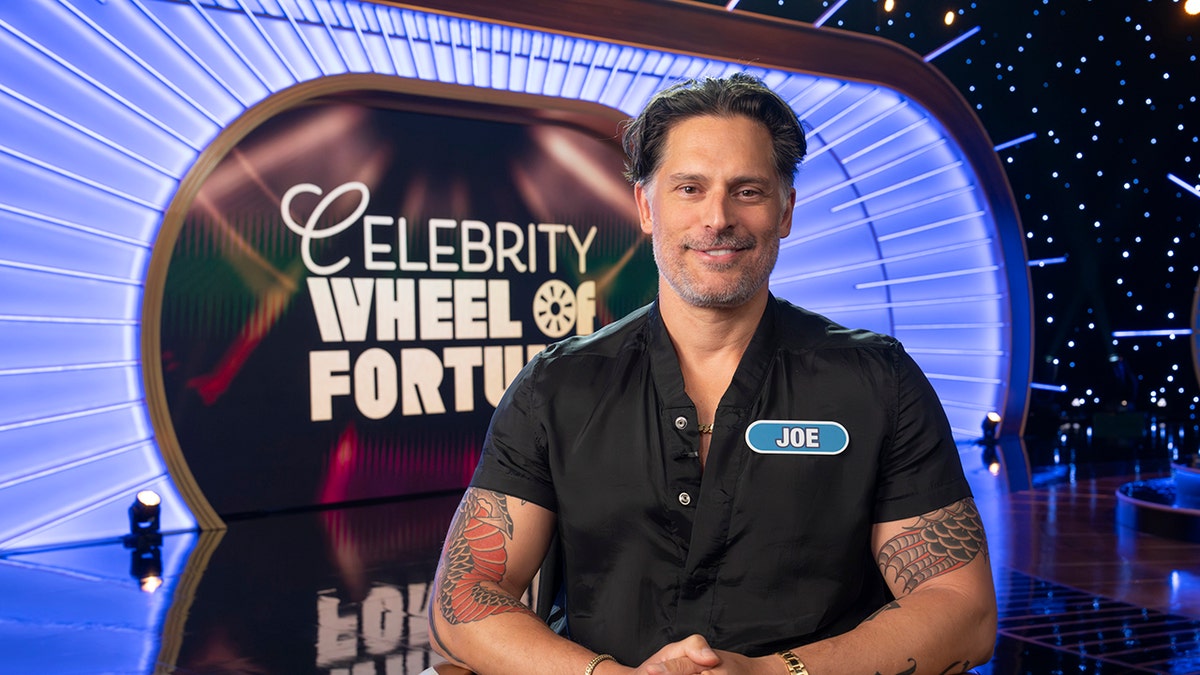 Joe Manganiello smiling as a participant on "Wheel of Fortune."