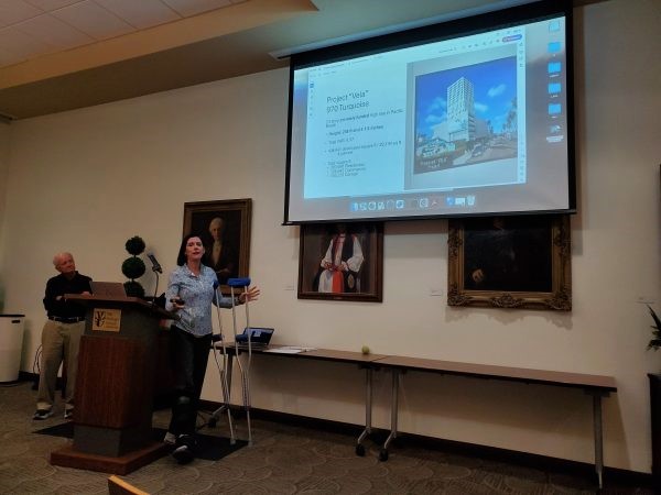 Neighbors for a Better California Chairwoman Marcella Bothwell, speaking to the La Jolla Community Planning Association in November 2024, shows what she called "our representation" of the development proposal for 970 Turquoise St. (Ashley Mackin-Solomon)
