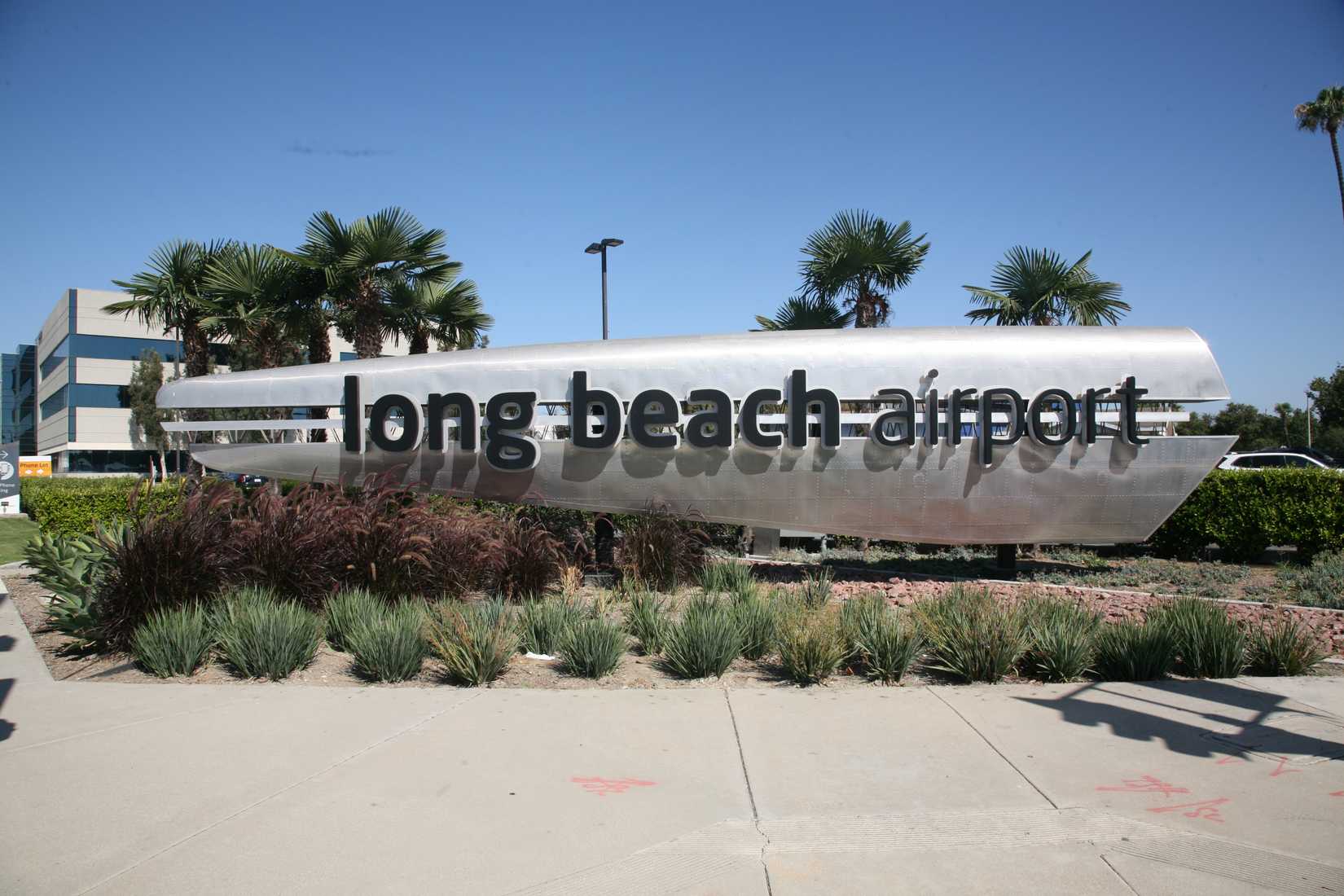 Long Beach Airport sign. Long Beach Airport is a public airport.