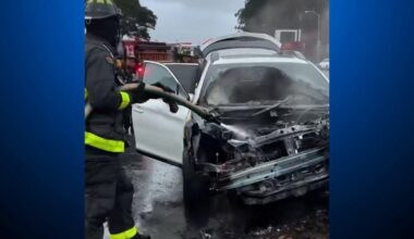 San Francisco firefighters rescue occupants from burning vehicle
