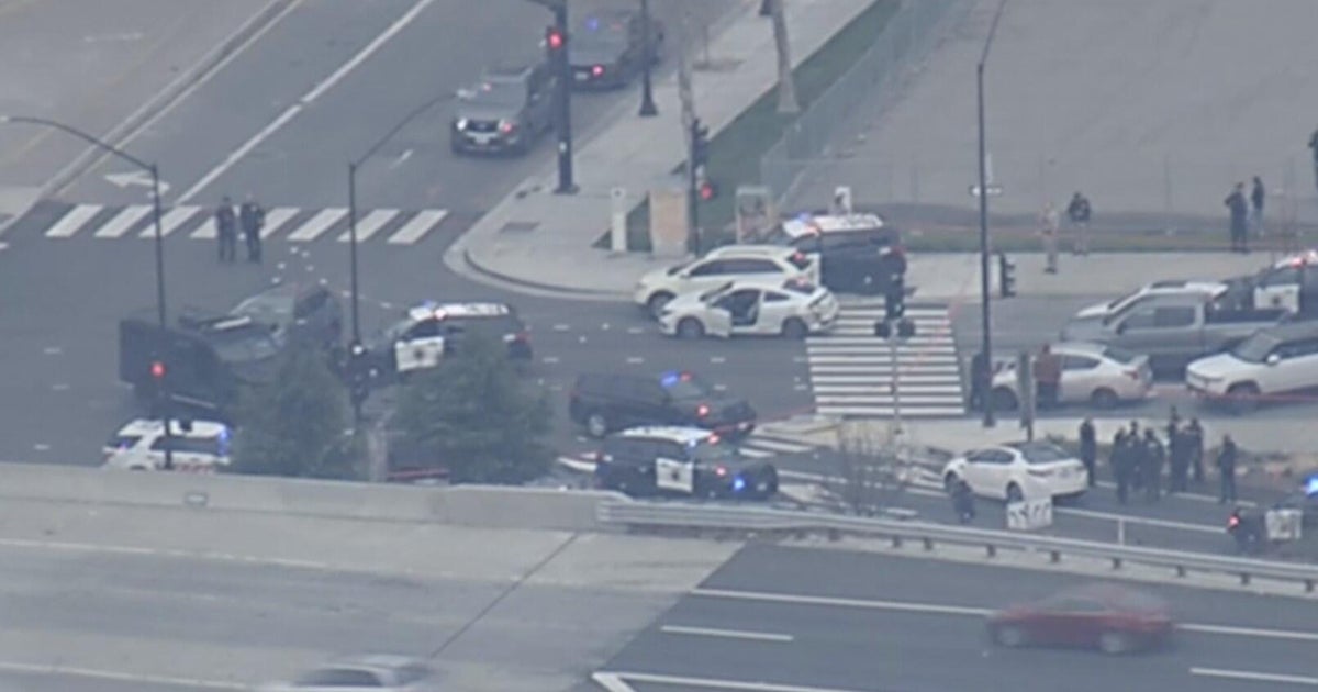 San Jose police say an officer was shot following a carjacking