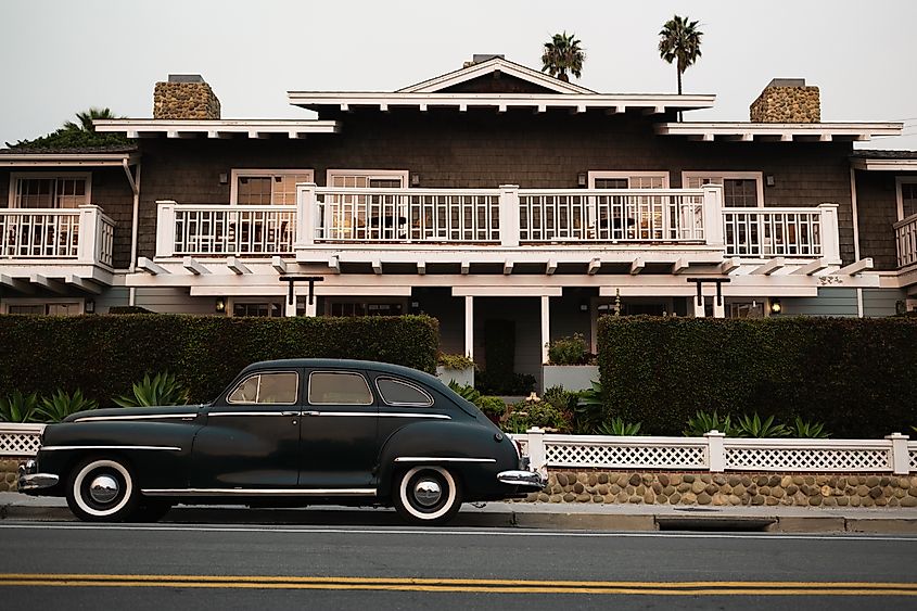 A vintage car parked outside the Inn On Summer Hill in Summerland, California 