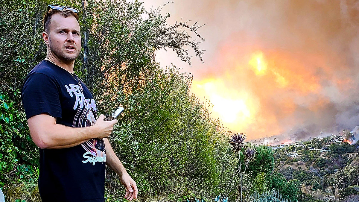 Spencer Pratt overlooking wildfire approaching home