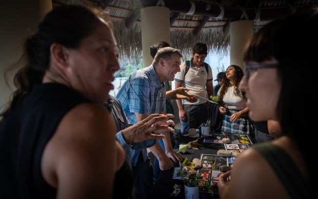 Jon Rebman, curator of botany at the San Diego Natural History Museum, shares research he and his team has been conducting in the region during a community event in El Sargento on Wednesday, Oct. 29, 2025. (Ana Ramirez / The San Diego Union-Tribune)