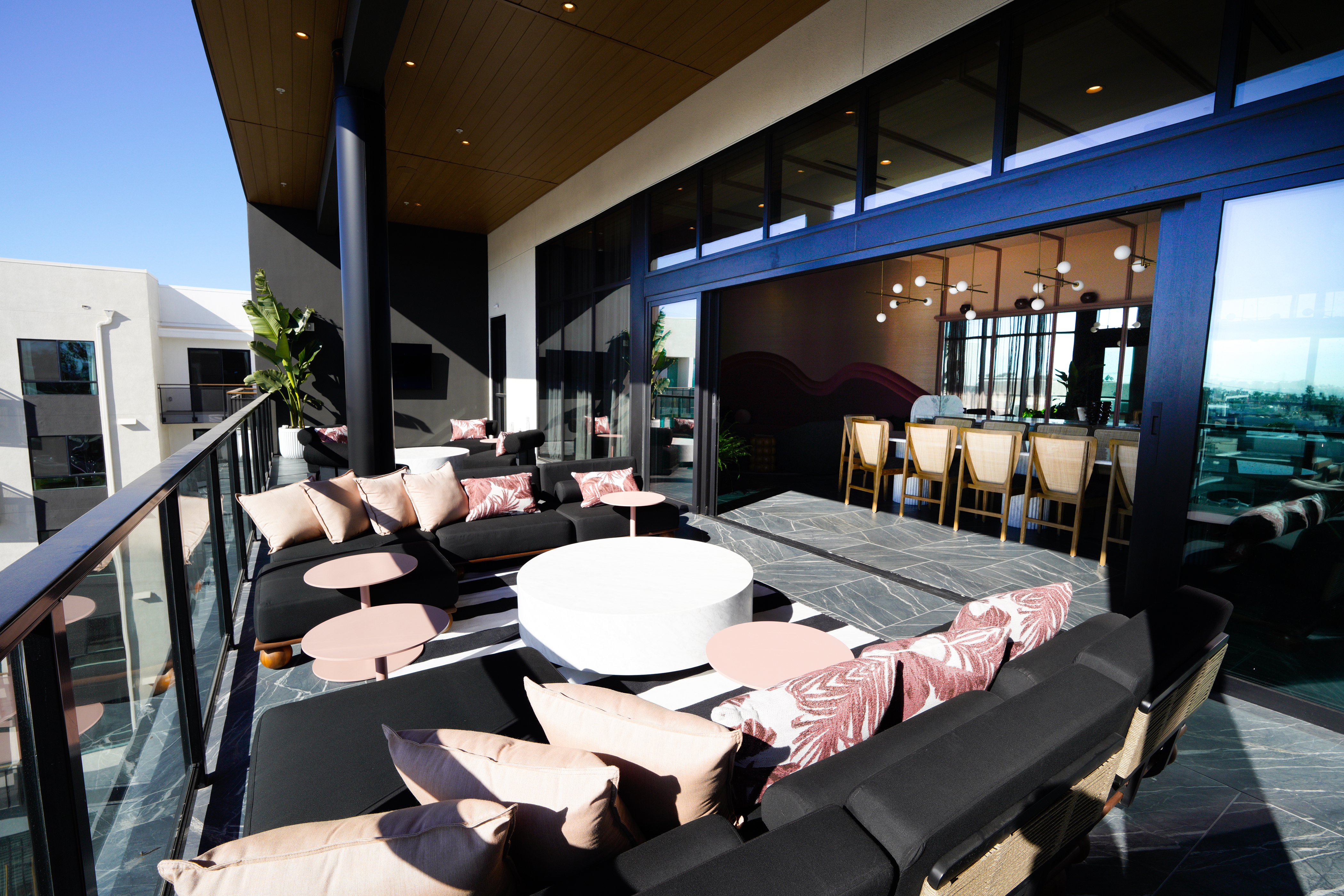 The Rose Lounge and sky deck at Alexan Camellia in...
