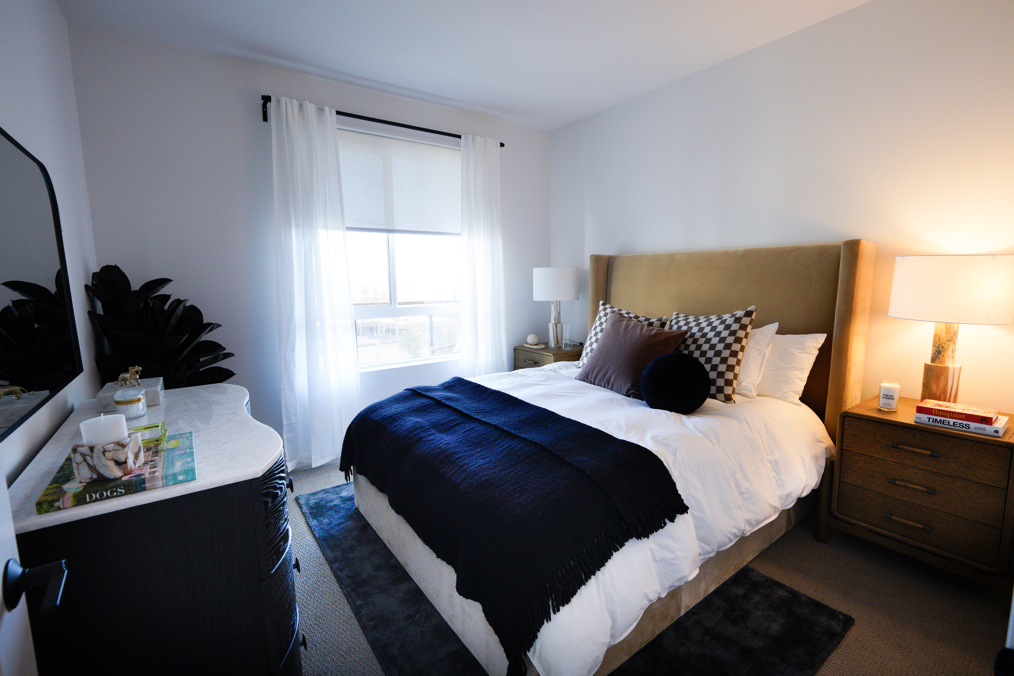 The bedroom of an apartment at the new Alexan Camellia...