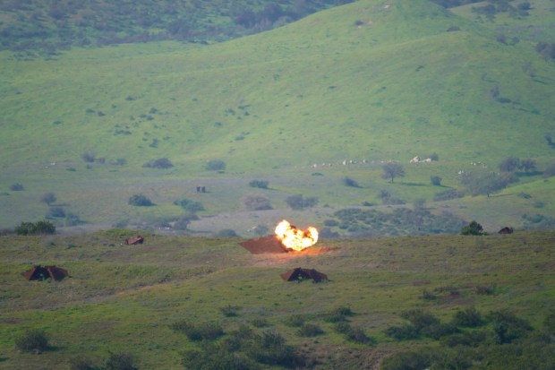 At a live fire range on Camp Pendleton, Marines successfully use an Archer drone to strike a target about one mile away. (Nelvin C. Cepeda / The San Diego Union-Tribune)