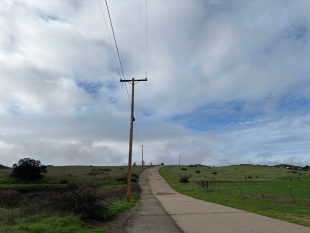 To reach the trails at Barnett Ranch County Preserve, hikers must first walk along a paved road. (Maura Fox / The San Diego Union-Tribune)