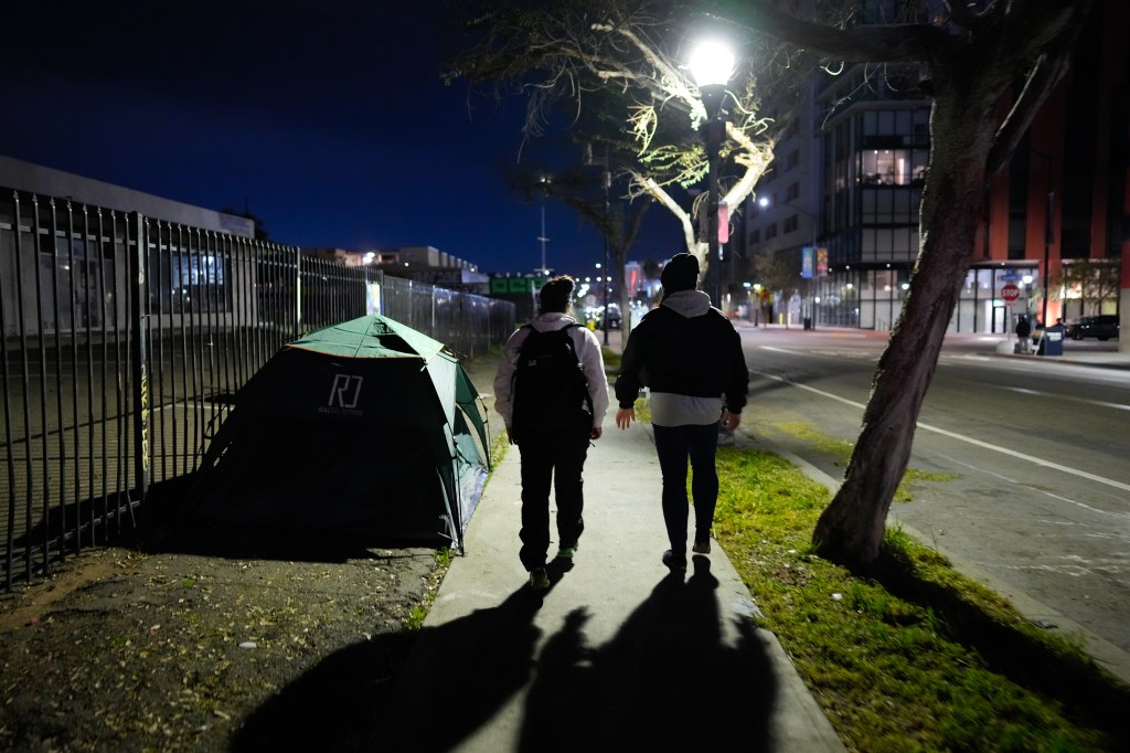 Volunteers go tent-to-tent, sidewalk-to-sidewalk to log data in online phone app