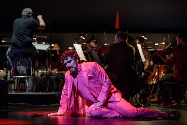 Argentine baritone Germán Enrique Alcántara at a dress rehearsal with San Diego Symphony musicians for San Diego Opera's 2024 production of "Don Giovanni," where the musicians were onstage with the actors.(Karli Cadel)