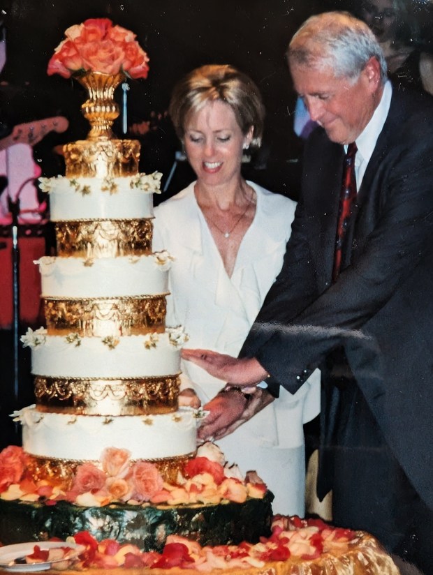 Sheryl and Harvey White cutting their wedding cake at The Old Globe in 2001. (The Old Globe)