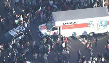 U-Haul drives through crowd of protesters in California