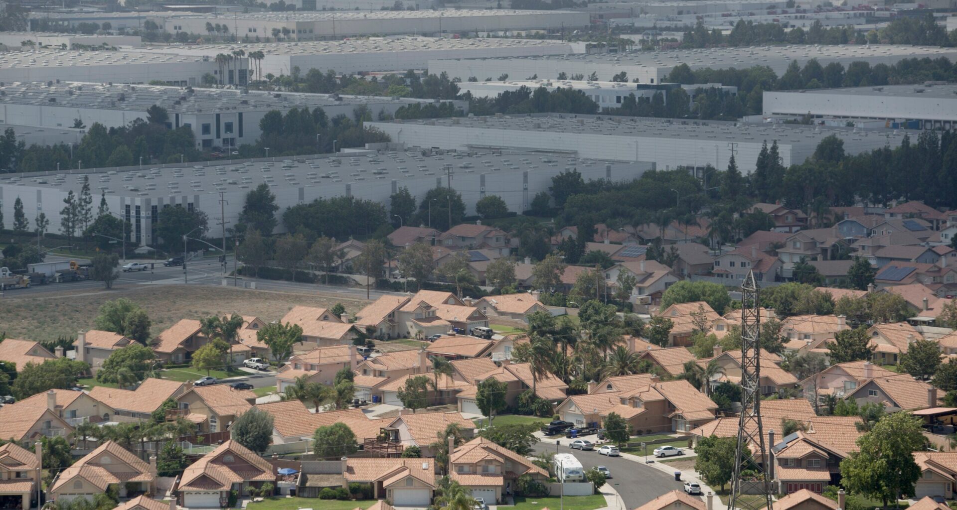 Warehouses bump up against homes in the Inland Empire.