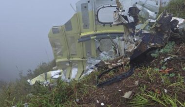 Indonesian rescuers find a body near plane wreckage