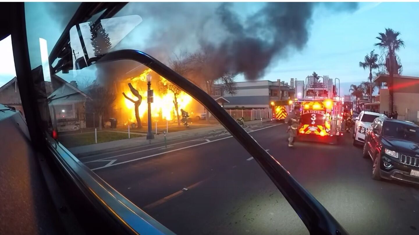Fresno firefighters rescue elderly resident as officer hospitalized following house fire