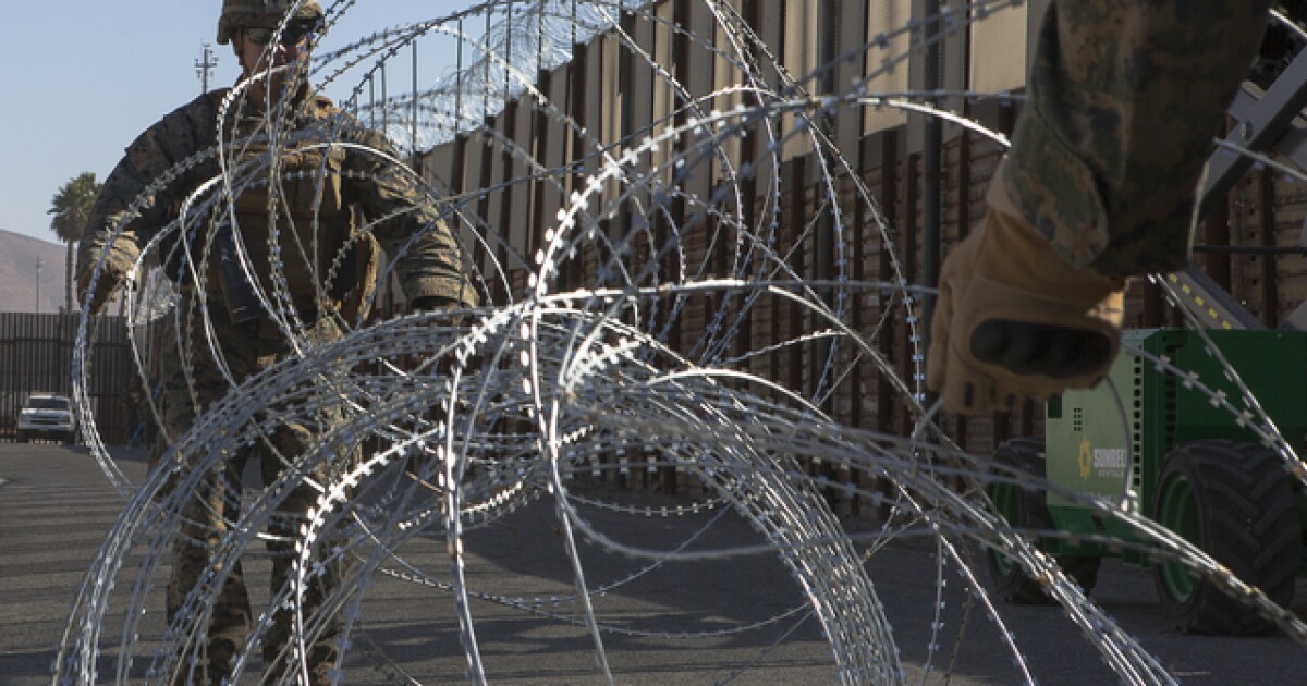 San Diego sues federal government over razor wire fence at border