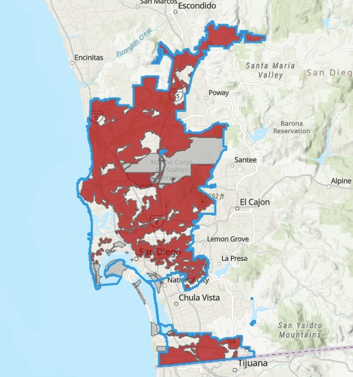 A map of San Diego with many zones highlighted in dark red.