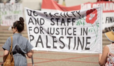 Demonstrators hold a UC Faculty and Staff for Justice in Palestine sign during a protest at UC Berkeley in August 2024. (Aaron Levy-Wolins/J. Staff)