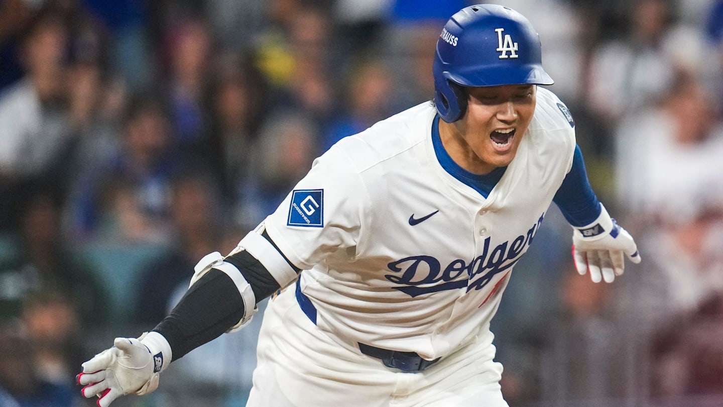 Los Angeles Dodgers designated hitter Shohei Ohtani (17) celebrates as he runs for first on an RBI single in the sixth inning of the MLB National League Wild Card Game 2 between the Los Angeles Dodgers and the Cincinnati Reds at Dodger Stadium in Los Angeles on Wednesday, Oct. 1, 2025. The Reds were eliminated from the postseason with an 8-4 loss to the reigning World Series Champions Dodgers.