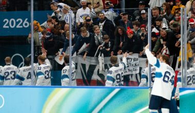 Feb 21, 2026; Milan, Italy; Finland celebrate with fans after the men's ice hockey bronze medal game during the Milano Cortina 2026 Olympic Winter Games at Milano Santagiulia Ice Hockey Arena. Mandatory Credit: Geoff Burke-Imagn Images