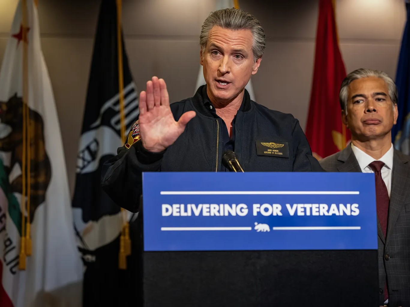 Newsom takes aim at veterans ‘claim sharks’ as he signs law banning fees for help with VA