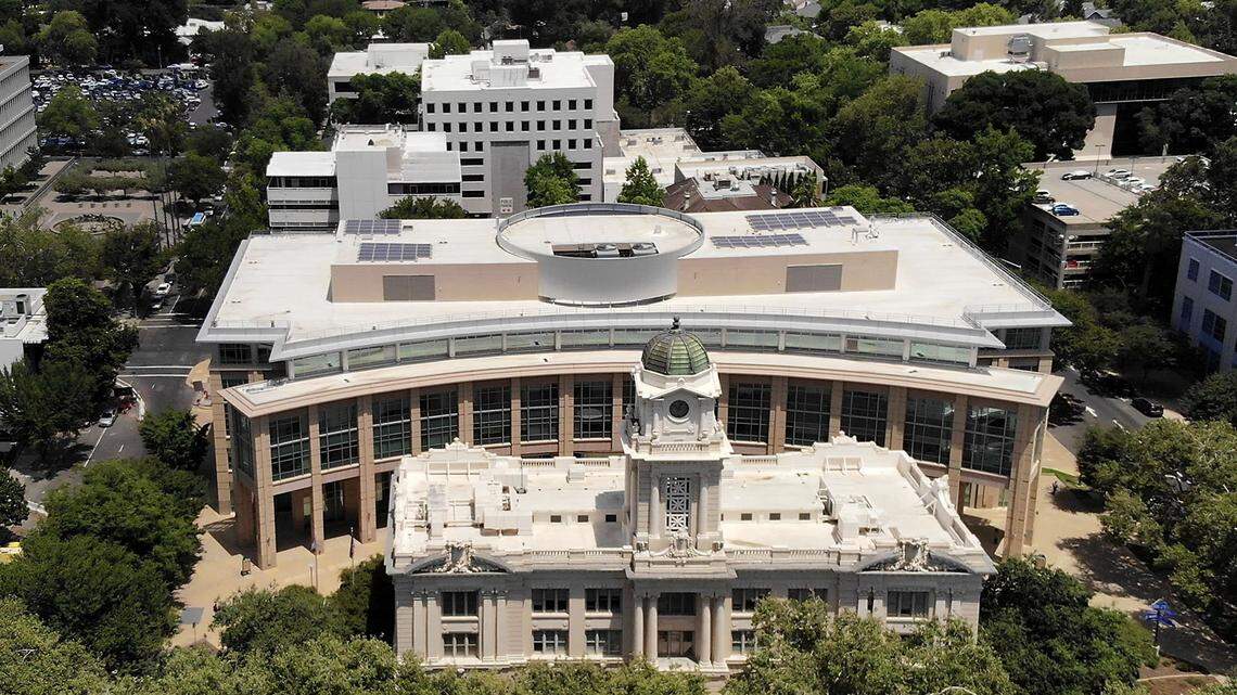 The old and new buildings of Sacramento’s City Hall stand downtown on July 12, 2018.