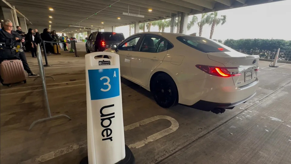 Uber driver picks up a rider at the Louis Armstrong International Airport in New Orleans. (NEXSTAR)