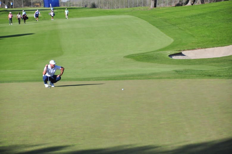Brooks Koepka addresses his putt on hole No. 7 of the North Course at Torrey Pines on Friday, Jan. 30. (Photo by Thomas Melville/Times of San Diego)