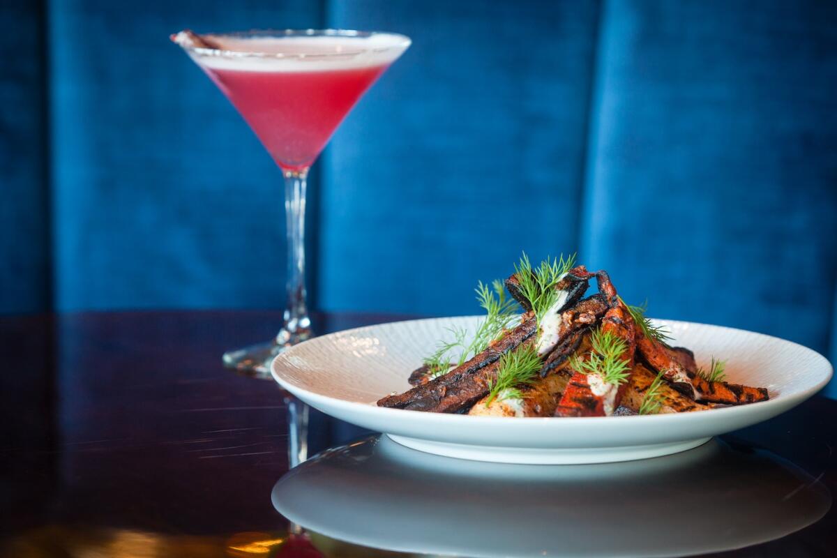 CdM Restaurant's BBQ heirloom carrots, paired with a pink Gin Blossom cocktail.