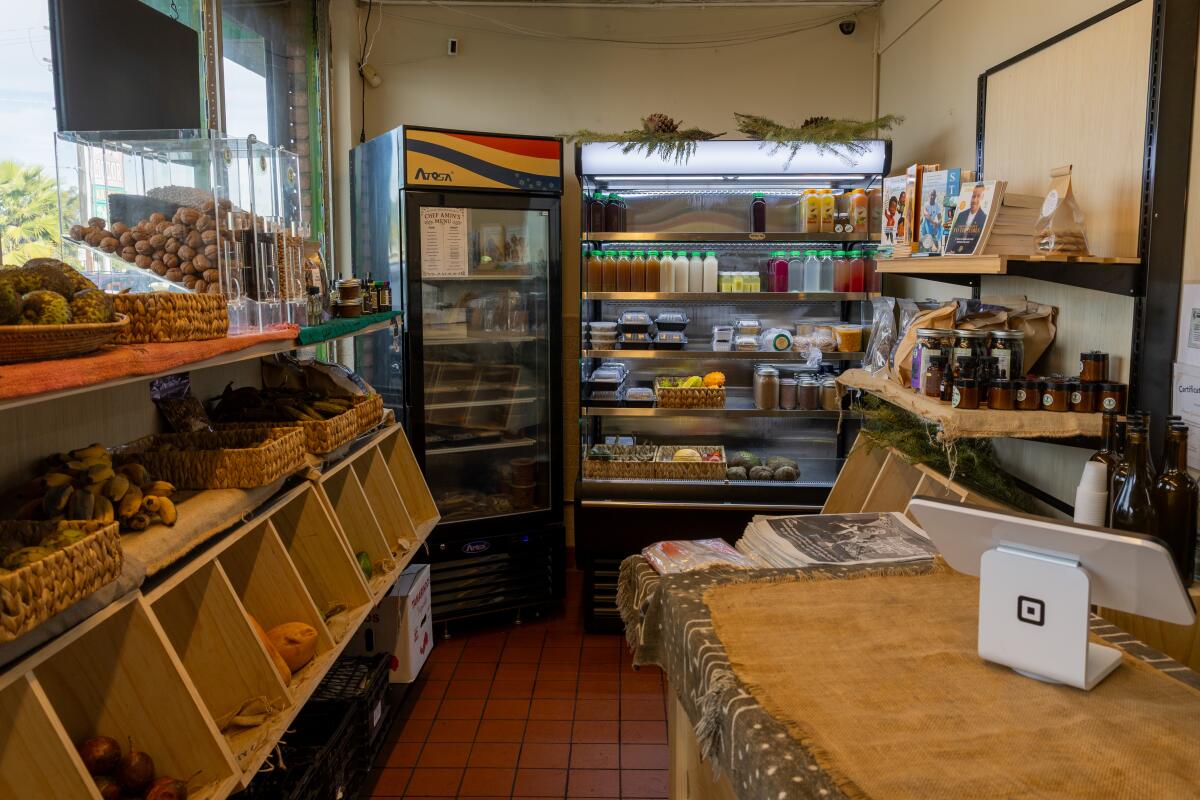 LoProduce, juices and other merchandise are on sale inside of Crenshaw Food Hub. 