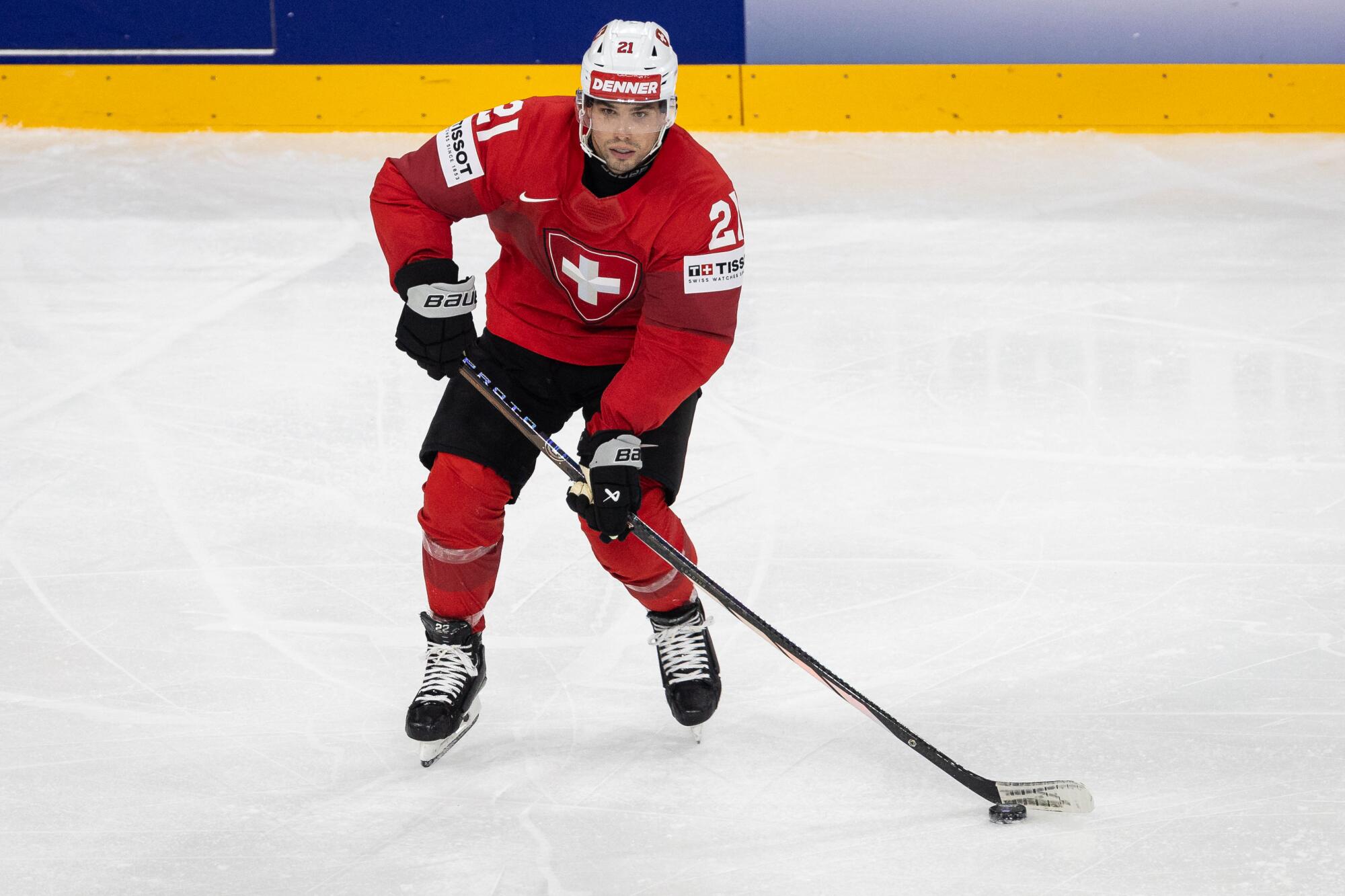 Kings forward Kevin Fiala controls the puck while playing for Team Switzerland at the 2025 world championships.