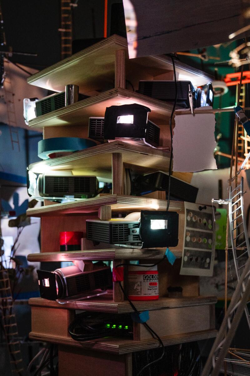 "Once in a Lifetime, 2026" mixed media made out of "wood, projectors, tripods, ladder, lights, aluminum, ceramic, paper, and paint," by Artist and Professor Sarah Sze at Gagosian in Beverly Hills on Jan. 28, 2026. (Ariana Drehsler/For The Times)