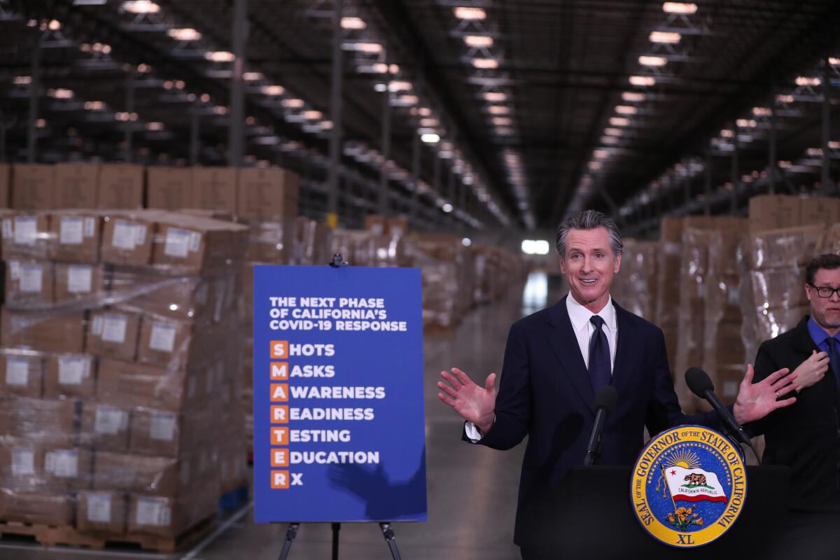 Gov. Gavin Newsom speaks at a news conference.