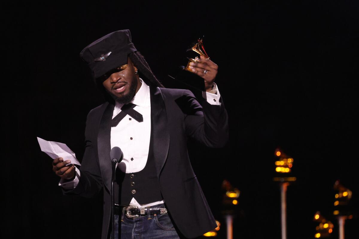 Shaboozey holds his Grammy and delivers an acceptance speech. 