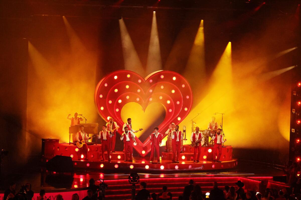 Bruno Mars performs on stage at the Grammy Awards.