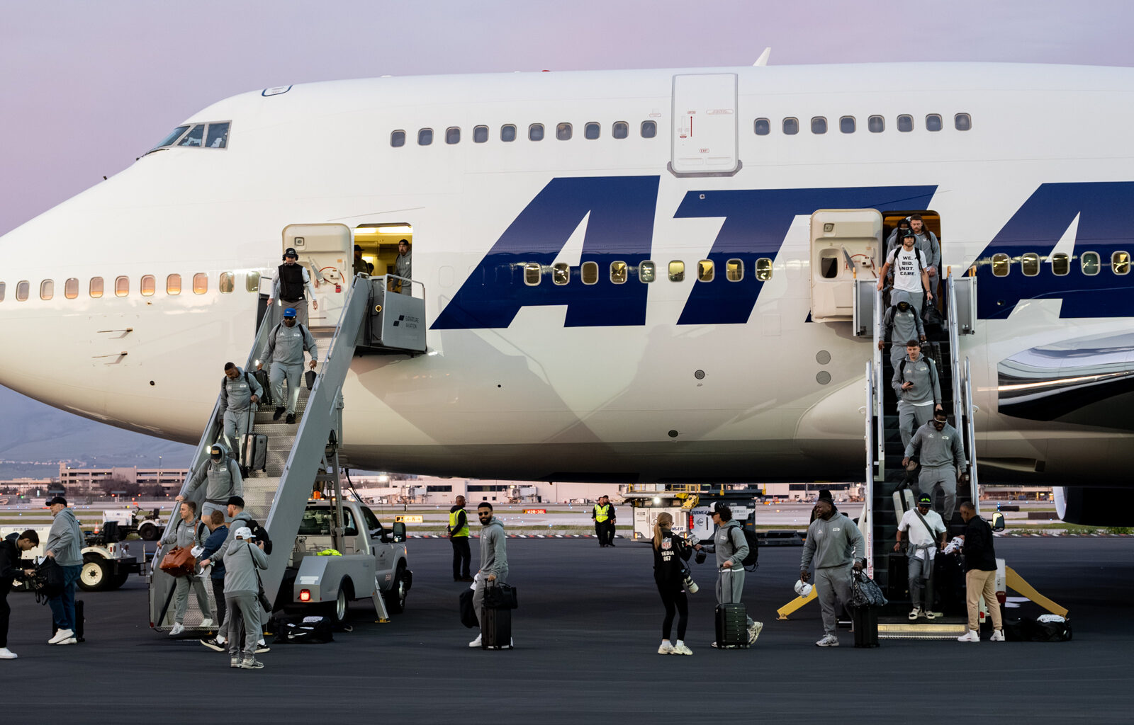 Photos: Patriots, Seahawks arrive at San Jose airport for Super Bowl week