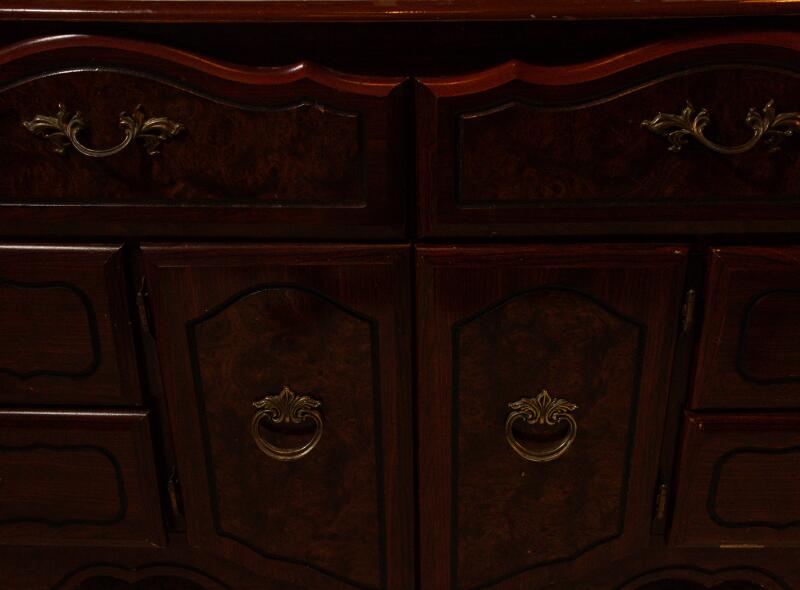 A chest of drawers in Adams' bedroom.