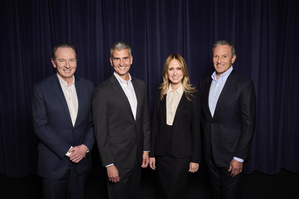 Disney Chairman James Gorman, Incoming CEO Josh D'Amaro; Incoming Chief Creative Officer Dana Walden and CEO Bob Iger.