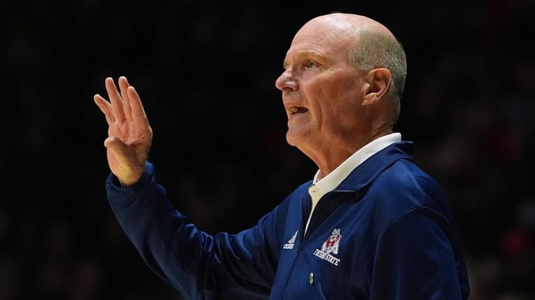 Fresno State head coach Vance Walberg looks on during the...