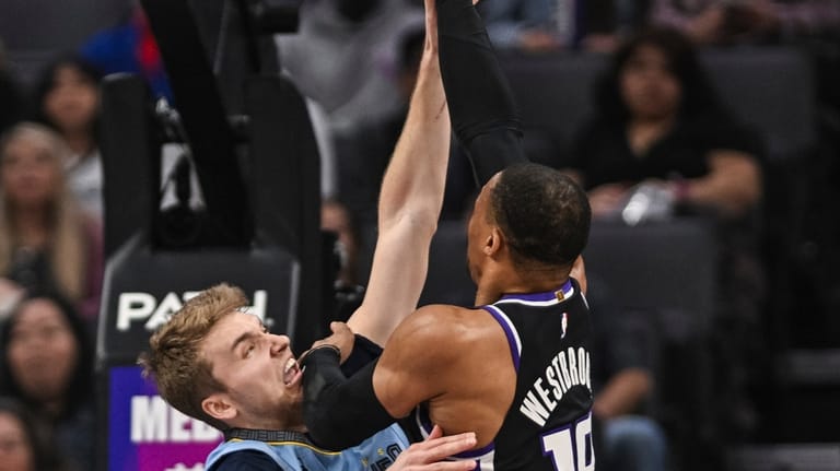 Sacramento Kings guard Russell Westbrook (18) shoots over Memphis Grizzlies...