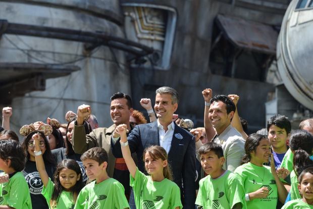 Josh D'Amaro, president of the Disneyland Resort, poses for group picture with children from local non-profits during their visit to Star Wars: Galaxy's Edge at Disneyland in Anaheim, CA, on Thursday, May 30, 2019. Disney invited more than 600 youngsters from local nonprofits to a sneak peek of the new land. (Photo by Jeff Gritchen, Orange County Register/SCNG)