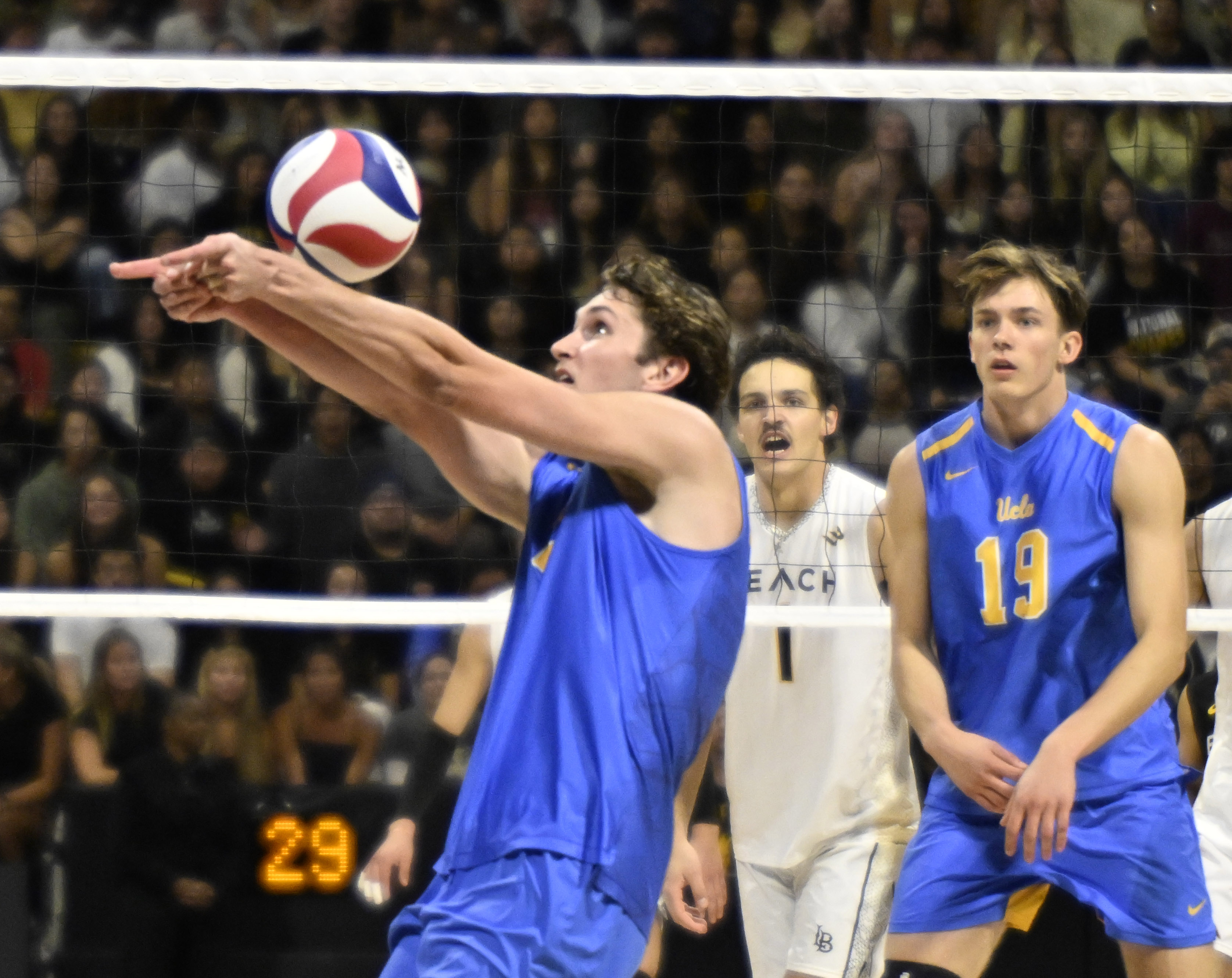 UCLA setter Andrew Rowan sets up a shot during the...