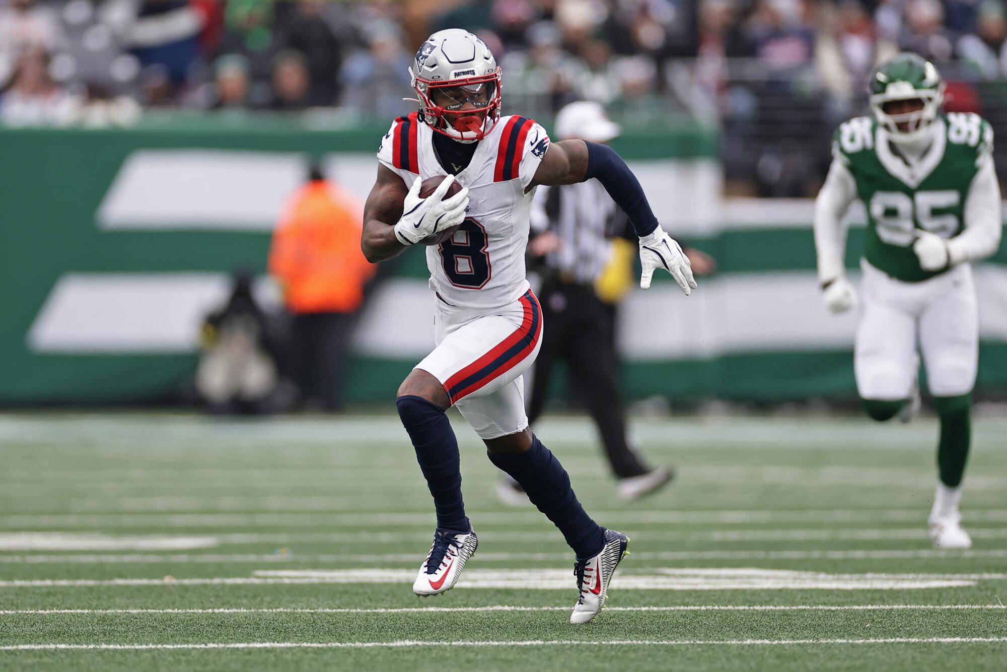 New England Patriots wide receiver Stefon Diggs runs with the ball against the New York Jets on Dec. 28.