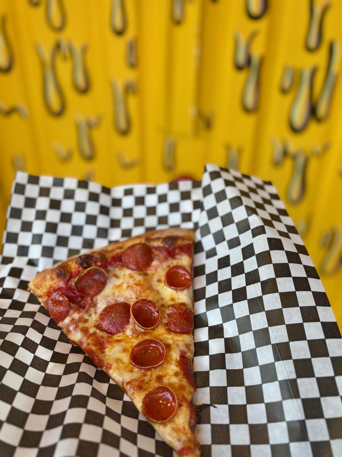 A classic slice of pepperoni pizza from Santos Pizza in Santa Ana.