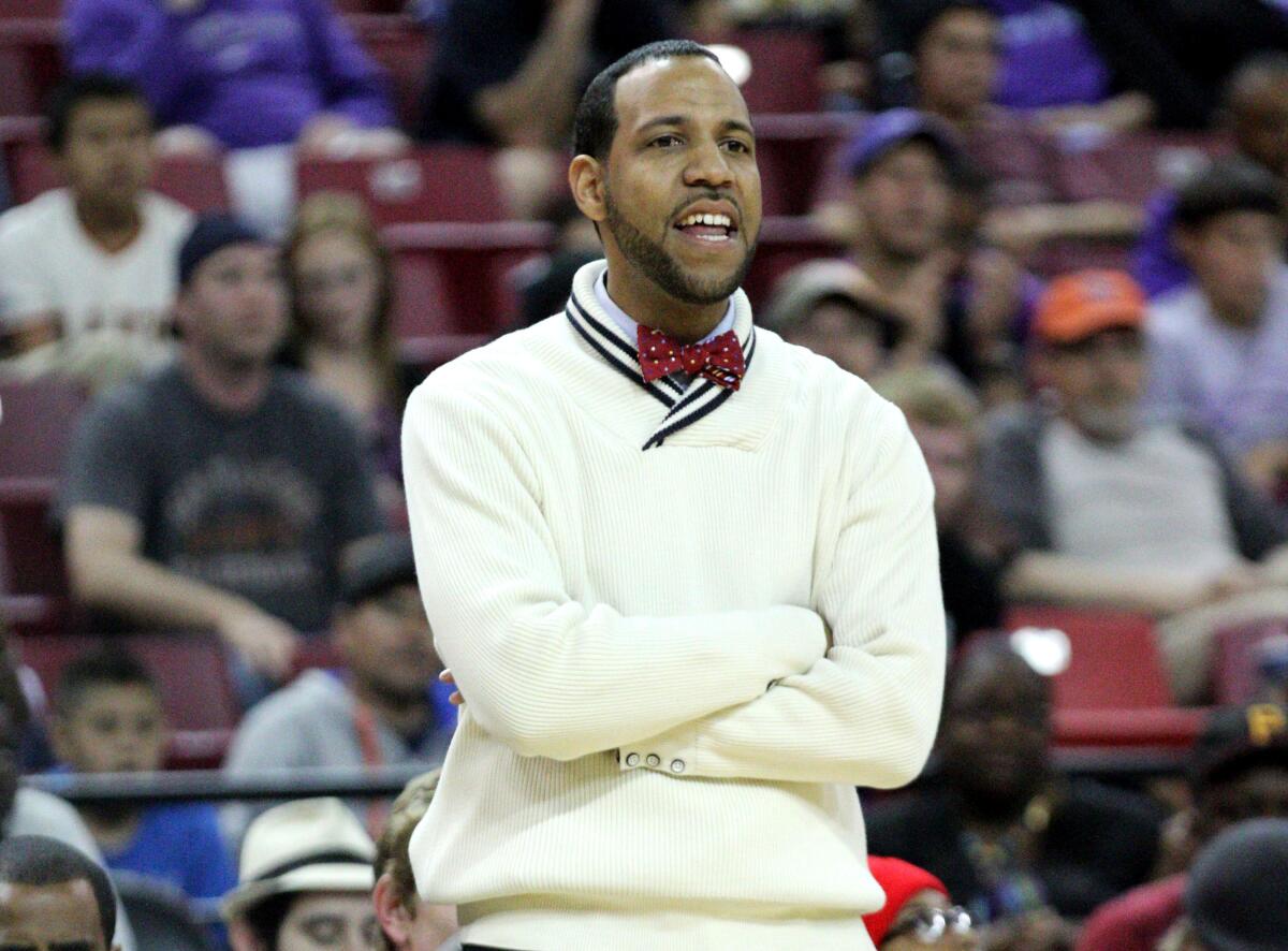 Reggie Morris Jr., in 2013. He has a collection of bow ties he brings out for the playoffs.