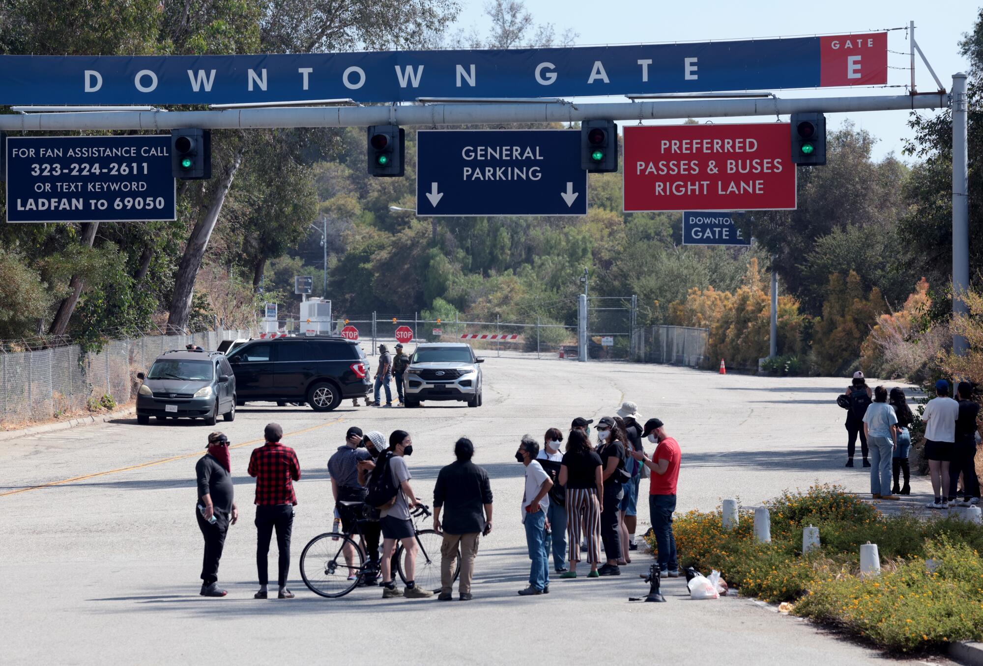 Federal immigration agents stage outside Gate E of Dodger Stadium on June 19. 